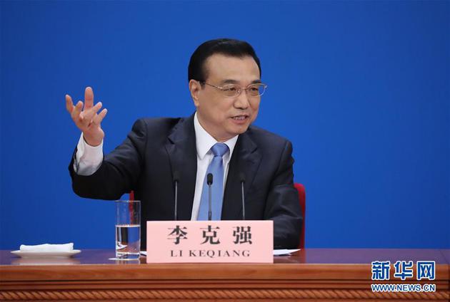 3月15日,国务院总理李克强在北京人民大会堂与中外记者见面,并回答记者提问。 新华社记者邢广利摄
